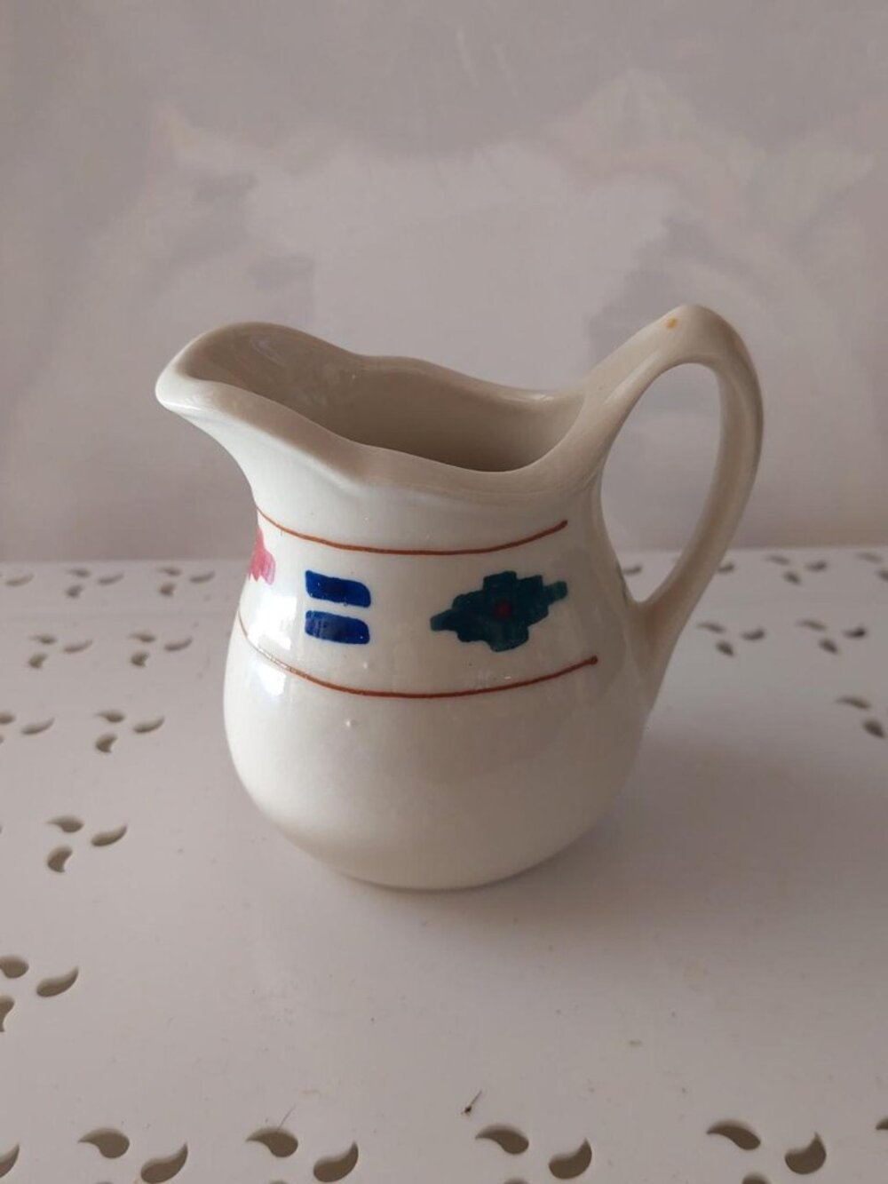 Hartstone Pottery "Cheyenne" pattern stoneware creamer pitcher featuring a hand-